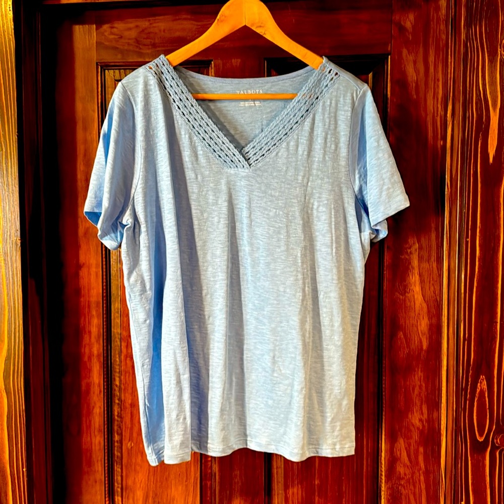 This has an adorable v-neck and is new without tags.